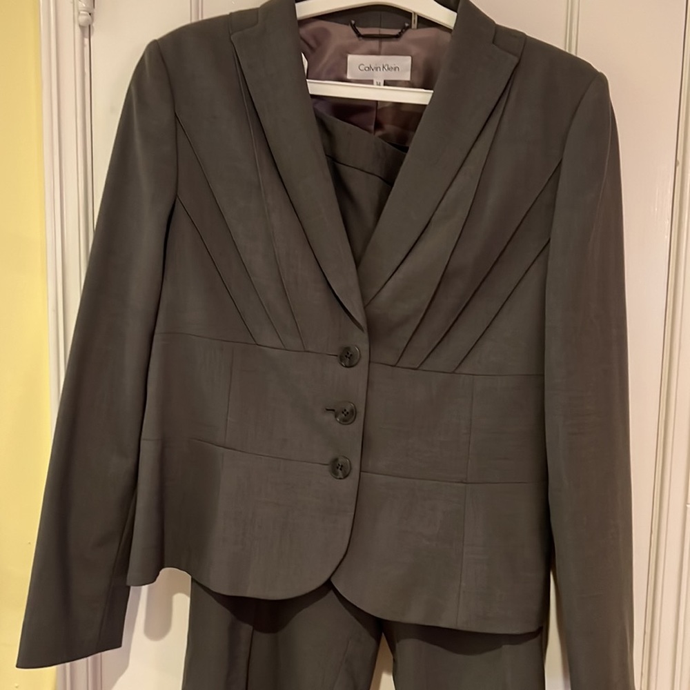 Grey Calvin Klein pant suit with wide leg.